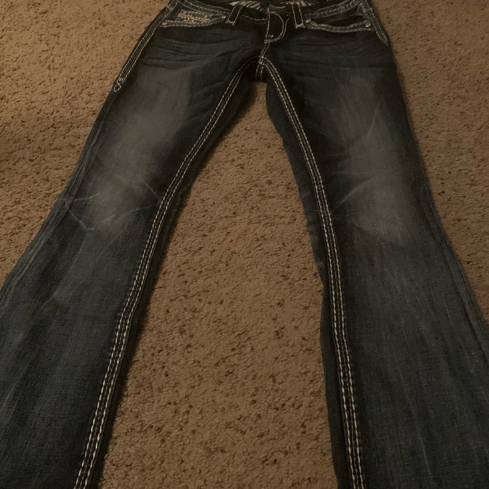 Only worn once rock revival jeans. Cleaning closet